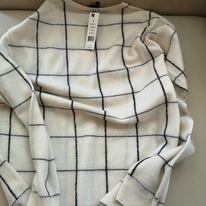 White wool sweater.